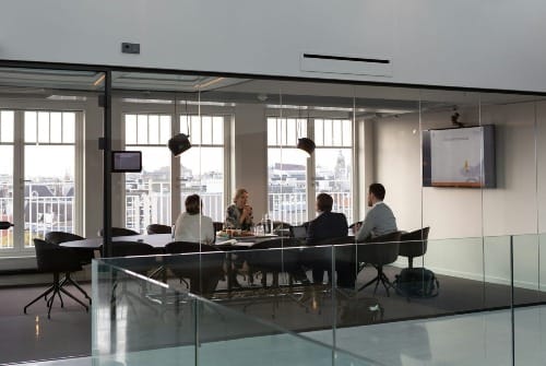 people sitting on chair inside building