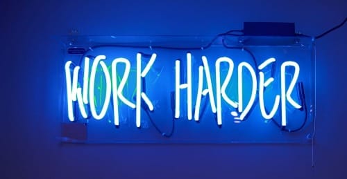 blue Work Harder neon signage